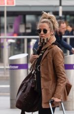 CAROLINE FLACK Arrives at Heathrow Airport in London 12/29/2019