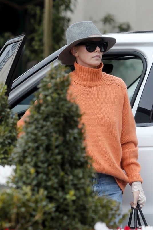 CHARLIZE THERON Out and About in Los Angeles 11/30/2019