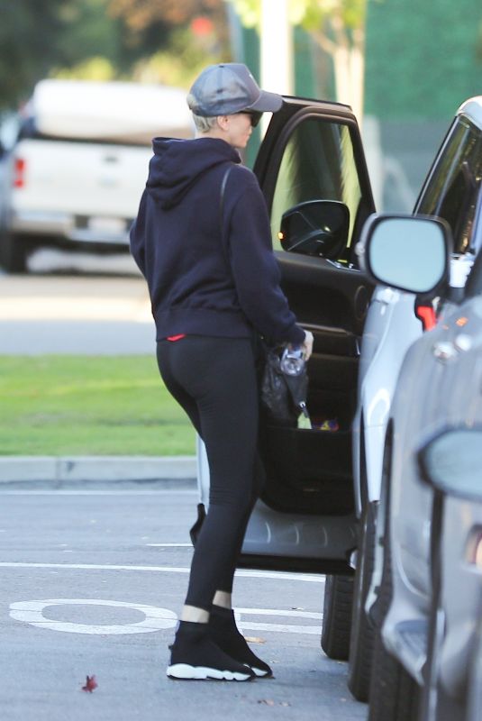 CHARLIZE THERON Out and About in West Hollywood 12/27/2019
