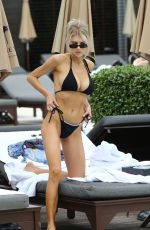 CHARLOTTE MCKINNEY in Bikini at a Beach in Miami 12/07/2019