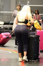 CHLE FERRY Grabbing Her Luggage at Airport in Norway 12/29/2019