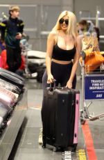 CHLE FERRY Grabbing Her Luggage at Airport in Norway 12/29/2019
