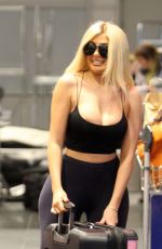 CHLE FERRY Grabbing Her Luggage at Airport in Norway 12/29/2019