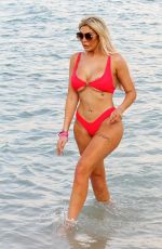 CHLOE FERRY in a Red Bikini on the Beach in Dubai 10/17/2019