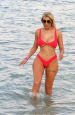 CHLOE FERRY in a Red Bikini on the Beach in Dubai 10/17/2019