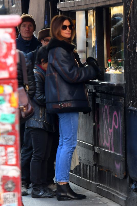 CINDY CRAWFORD Waits in Line for Food in New York 12/12/2019