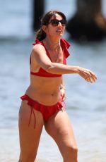 DAVINA MCCALL in a Red Bikini at a Beach in Sydney 12/28/2019