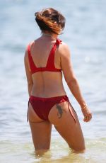 DAVINA MCCALL in a Red Bikini at a Beach in Sydney 12/28/2019