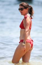 DAVINA MCCALL in a Red Bikini at a Beach in Sydney 12/28/2019