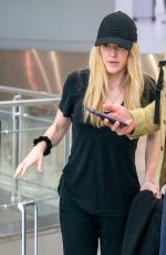 ELLIE GOULDING and Caspar Jopling at Miami International Airport 12/29/2019