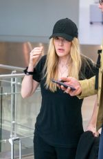ELLIE GOULDING and Caspar Jopling at Miami International Airport 12/29/2019