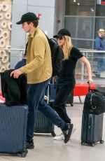 ELLIE GOULDING and Caspar Jopling at Miami International Airport 12/29/2019