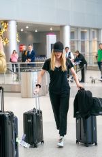 ELLIE GOULDING and Caspar Jopling at Miami International Airport 12/29/2019