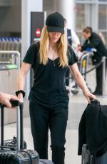 ELLIE GOULDING and Caspar Jopling at Miami International Airport 12/29/2019