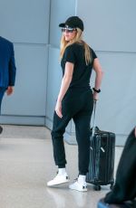 ELLIE GOULDING and Caspar Jopling at Miami International Airport 12/29/2019