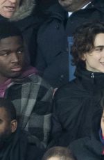 FLORENCE PUGH and Timothee Chalamet at PSG Match at Parc Des Princes in Paris 12/11/2019