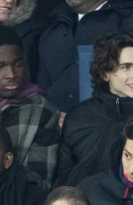 FLORENCE PUGH and Timothee Chalamet at PSG Match at Parc Des Princes in Paris 12/11/2019