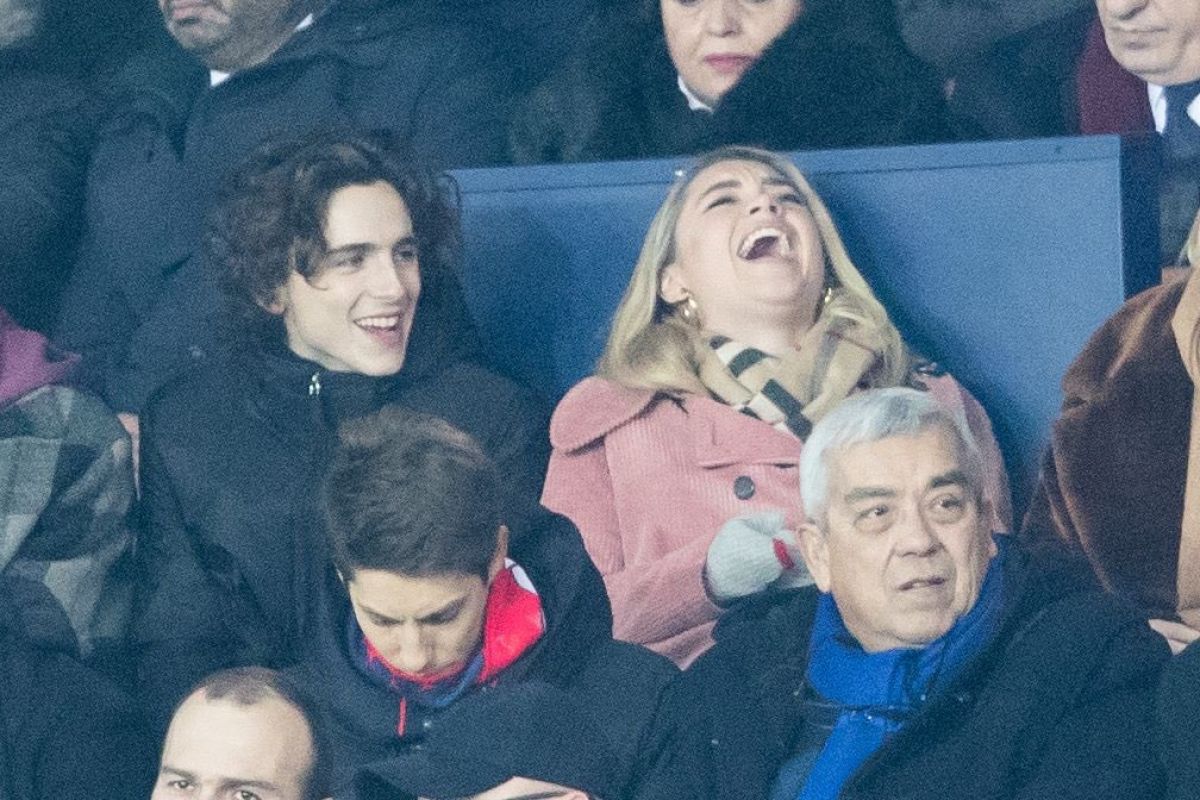 FLORENCE PUGH and Timothee Chalamet at PSG Match at Parc Des Princes in ...