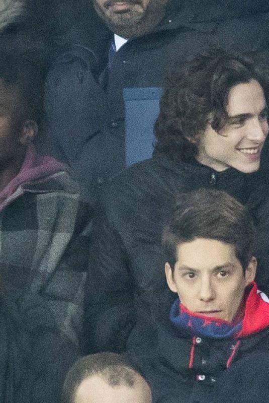 FLORENCE PUGH and Timothee Chalamet at PSG Match at Parc Des Princes in ...