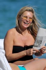 KATE MOSS in Swimsuit on the Beach in Miami 12/03/2019