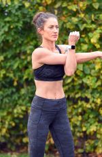 KATIE WAISSEL Works Out at a Park a London 12/28/2019