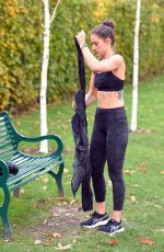 KATIE WAISSEL Works Out at a Park a London 12/28/2019