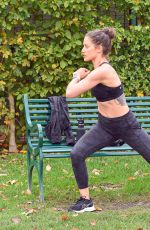 KATIE WAISSEL Works Out at a Park a London 12/28/2019