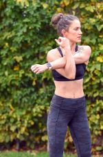 KATIE WAISSEL Works Out at a Park a London 12/28/2019