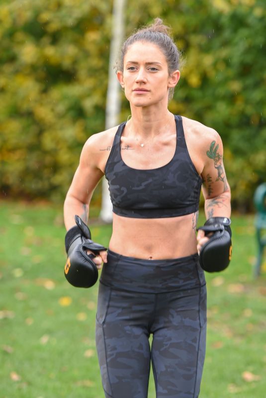 KATIE WAISSEL Works Out at a Park a London 12/28/2019