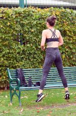 KATIE WAISSEL Works Out at a Park a London 12/28/2019