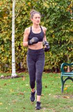 KATIE WAISSEL Works Out at a Park a London 12/28/2019