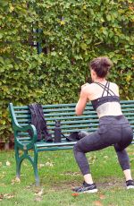 KATIE WAISSEL Works Out at a Park a London 12/28/2019
