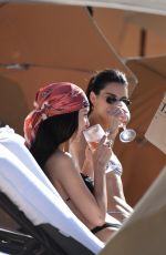 KENDALL JENNER and BELLA HADID in Bikinis at a Beach in Miami 12/04/2019