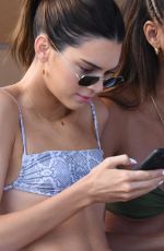 KENDALL JENNER and BELLA HADID in Bikinis at a Beach in Miami 12/04/2019