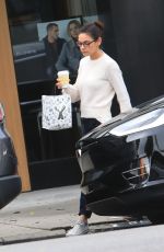MILA KUNIS Leaves Alfred