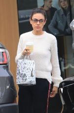 MILA KUNIS Leaves Alfred