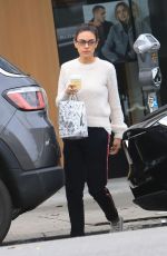 MILA KUNIS Leaves Alfred