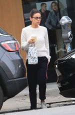 MILA KUNIS Leaves Alfred