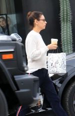 MILA KUNIS Leaves Alfred