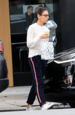MILA KUNIS Leaves Alfred