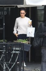 MILA KUNIS Leaves Alfred