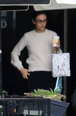 MILA KUNIS Leaves Alfred