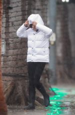 MILA KUNIS Out on a Rainy Day in Los Angeles 12/08/2019