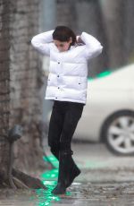 MILA KUNIS Out on a Rainy Day in Los Angeles 12/08/2019