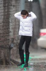 MILA KUNIS Out on a Rainy Day in Los Angeles 12/08/2019