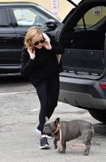 REESE WITHERSPOON Out with her Dog Pepper in Brentwood 12/08/2019