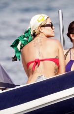RITA ORA in Bikini at a Beach 12/21/2019