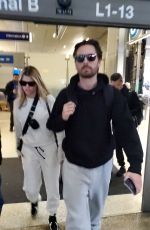 SOFIA RICHIE and Scott Disick at LAX Airport in Los Angeles 12/21/2019