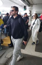 SOFIA RICHIE and Scott Disick at LAX Airport in Los Angeles 12/21/2019