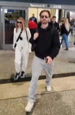 SOFIA RICHIE and Scott Disick at LAX Airport in Los Angeles 12/21/2019